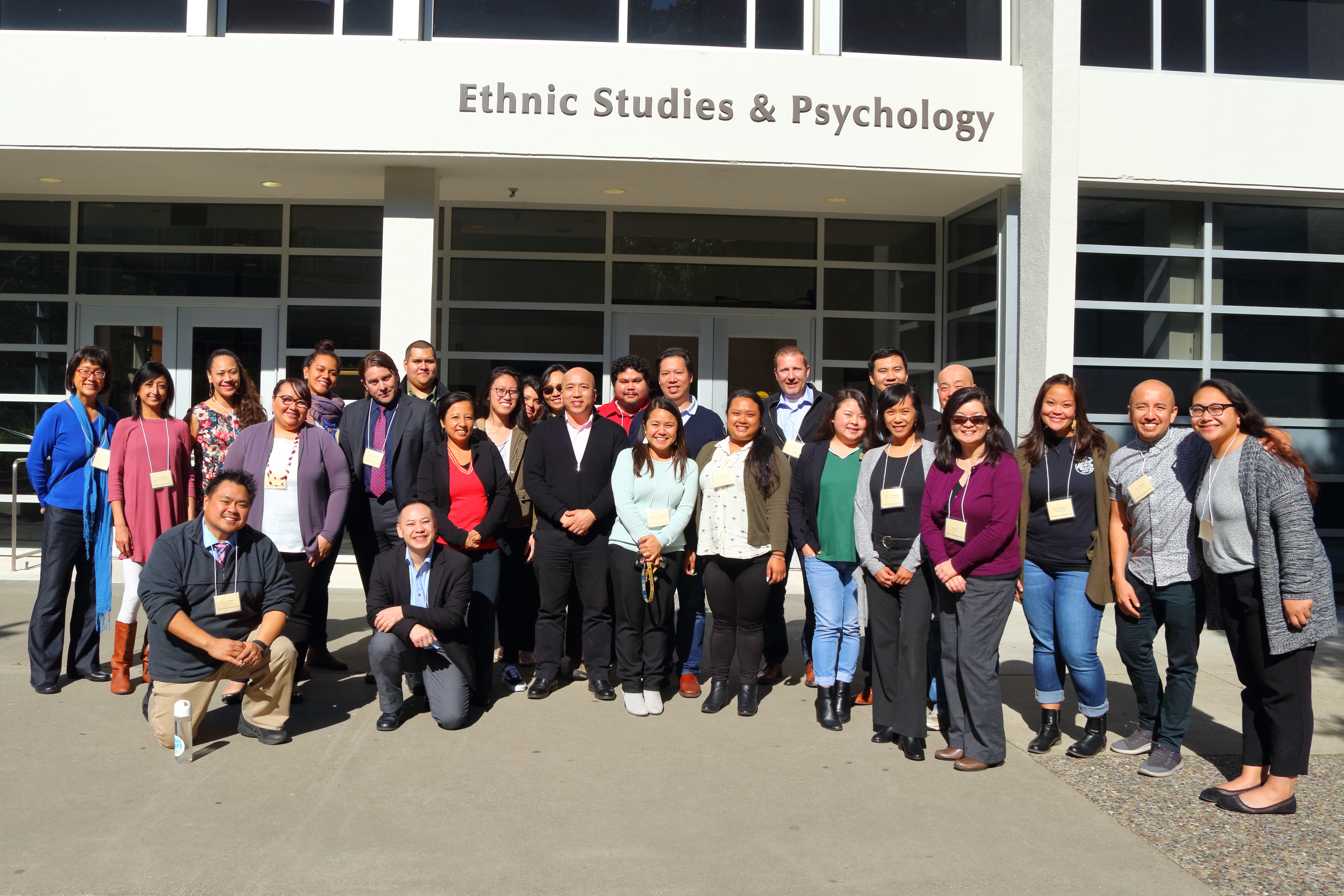 AAPI group of members in front of the Ethnic Studies & Psychology building
